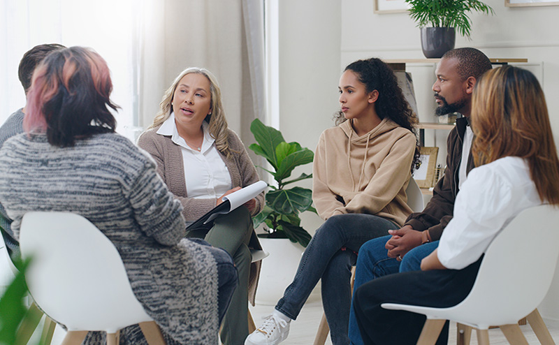 people in group counselling session