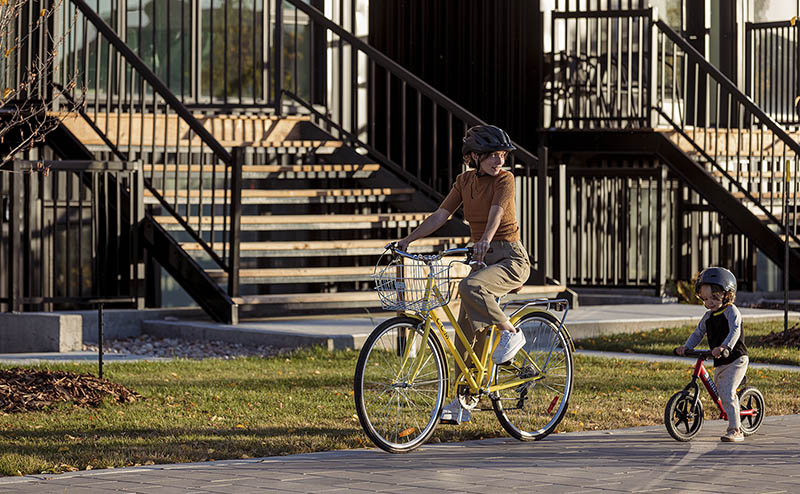 A family cycling in Blatchford