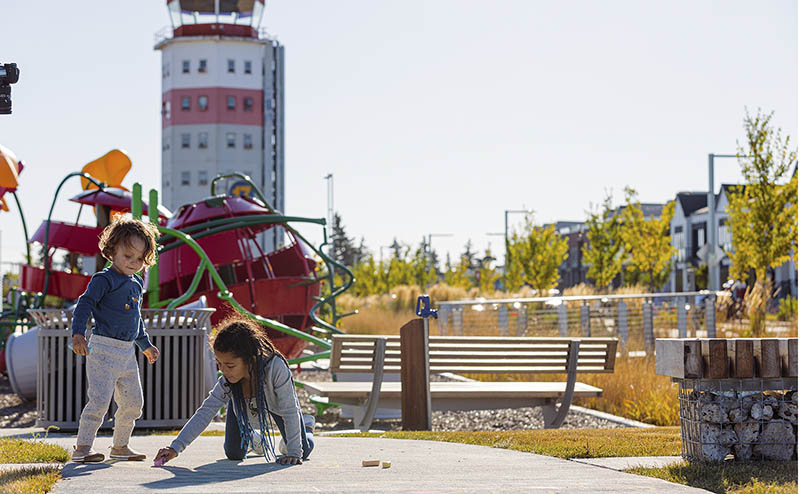 Kids enjoying a playground in Blatchford.