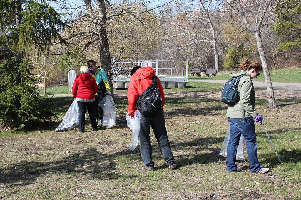 people picking up litter