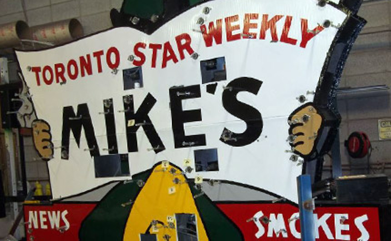 Mike's News Sign