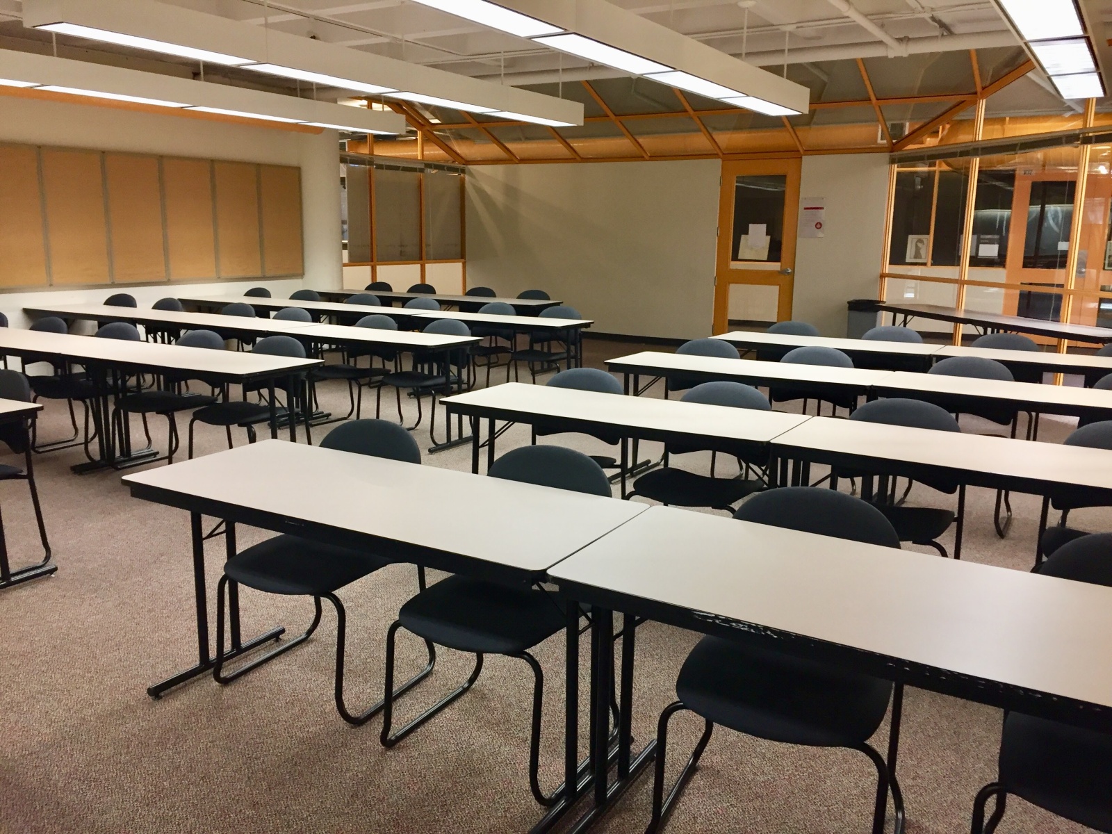 classroom with desk and chairs