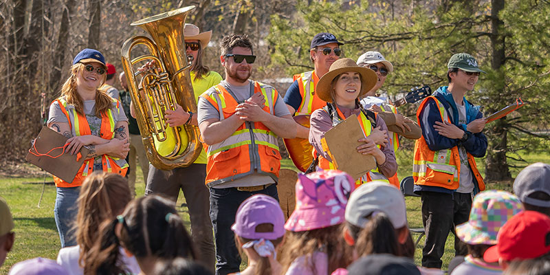 Volunteers at an Arbor Day celebration