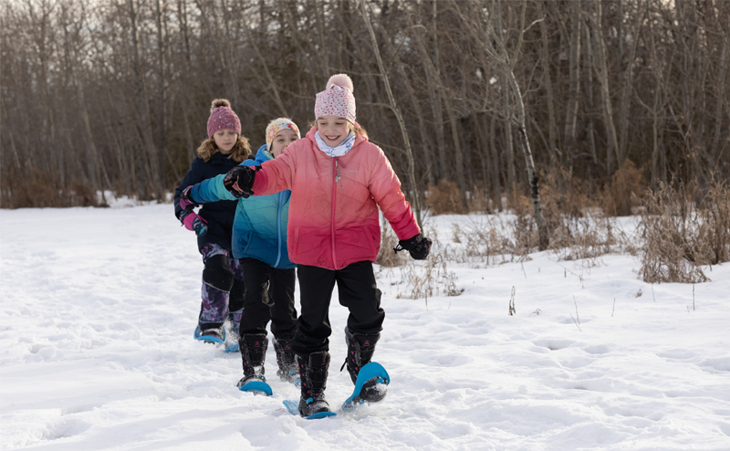 Kids snowshoeing