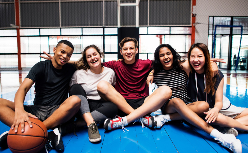 Photo of a group of five youths.