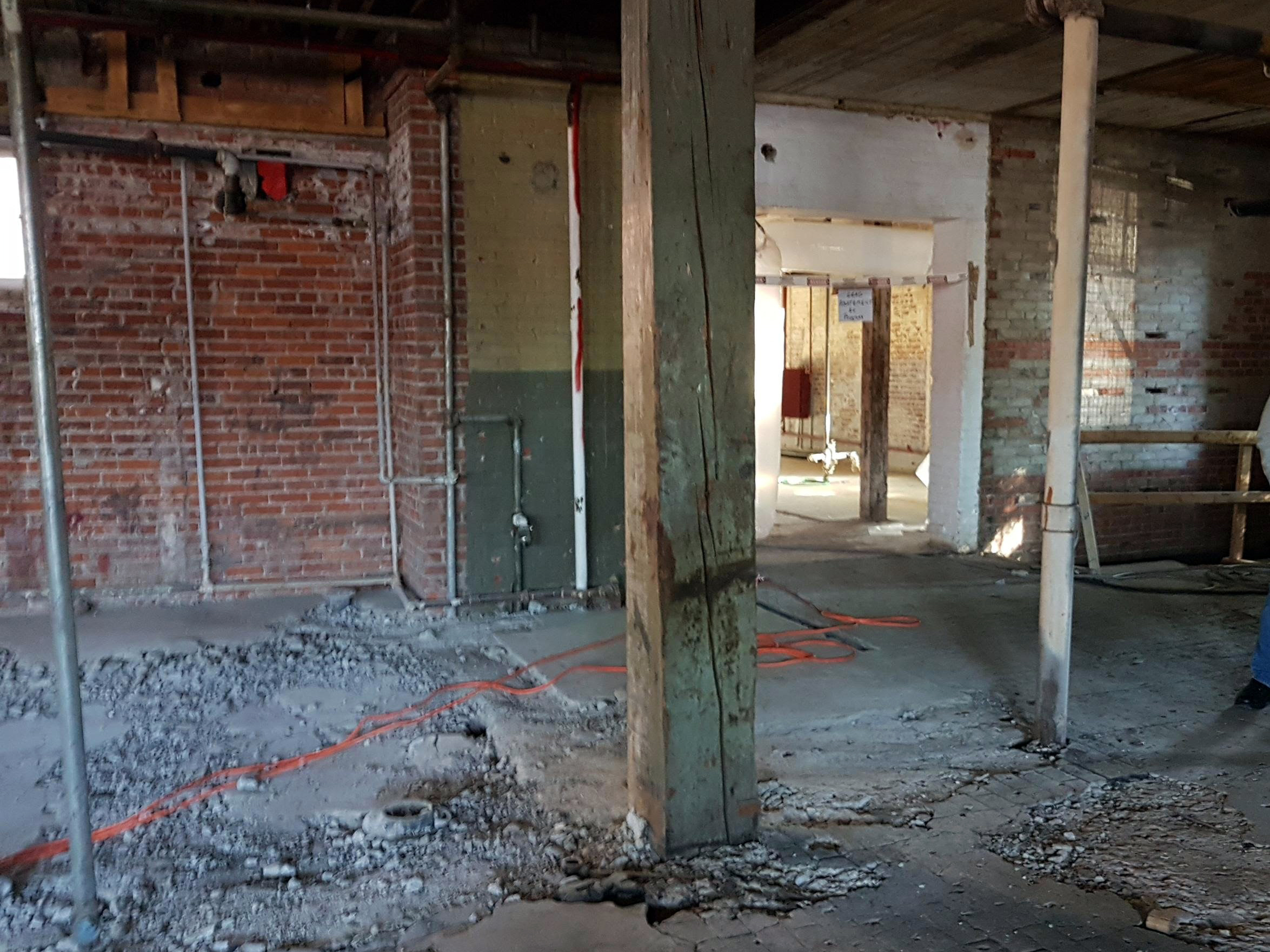 Room demolition during Ortona Armoury rehabilitation project