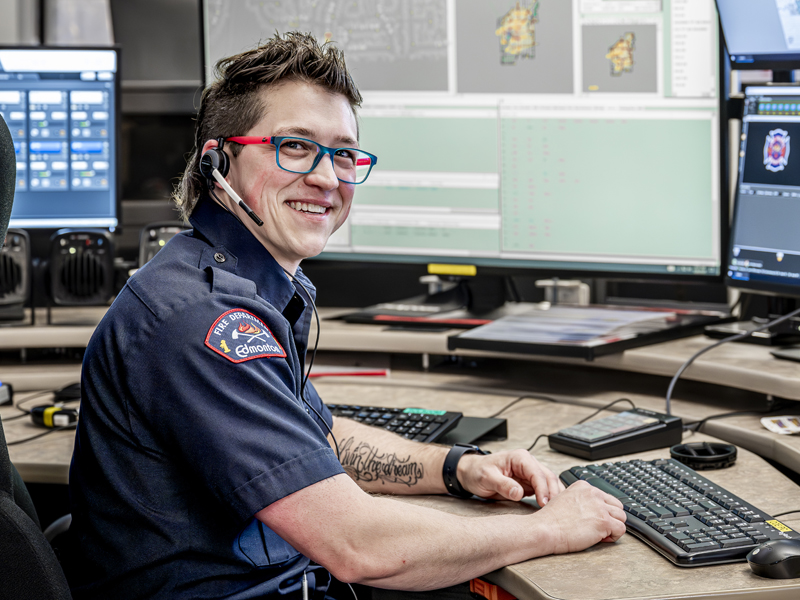 dispatcher sitting in front of computers