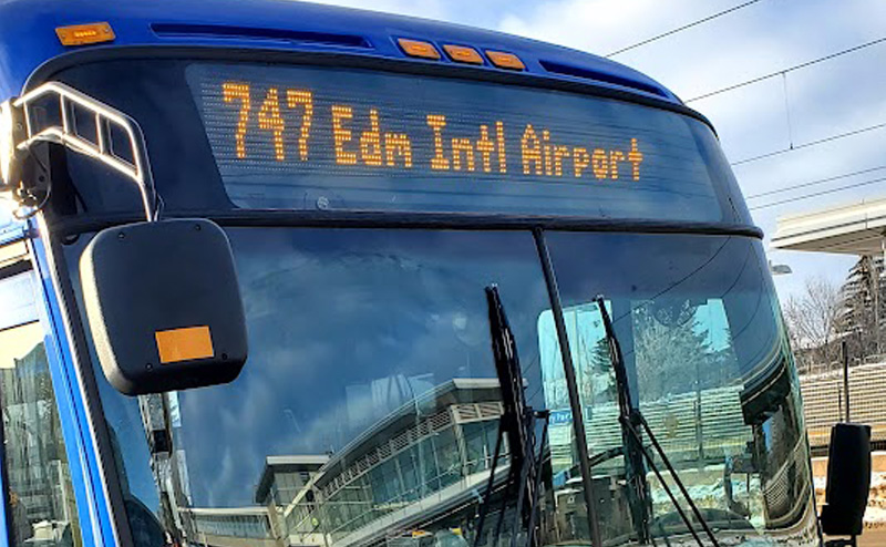 747 Edmonton International Airport message on front of bus