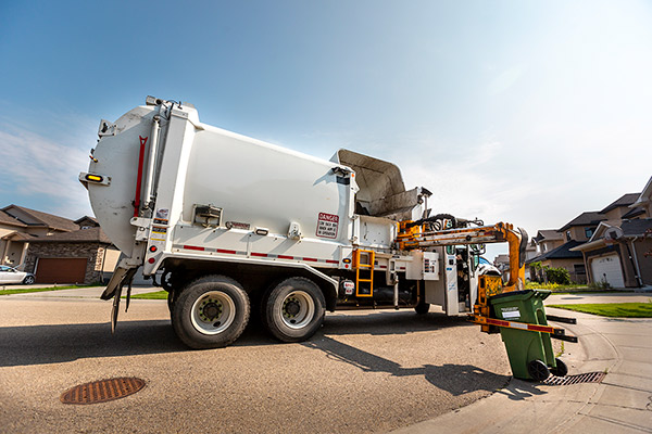 garbage collection truck and bin