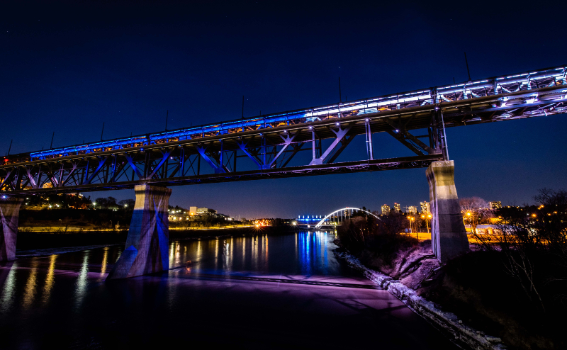 High Level Bridge lit up at night with Walterdale Bridge in the background