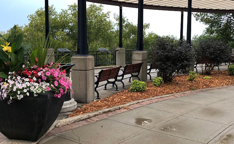Outdoor space with benches overlooking the river valley
