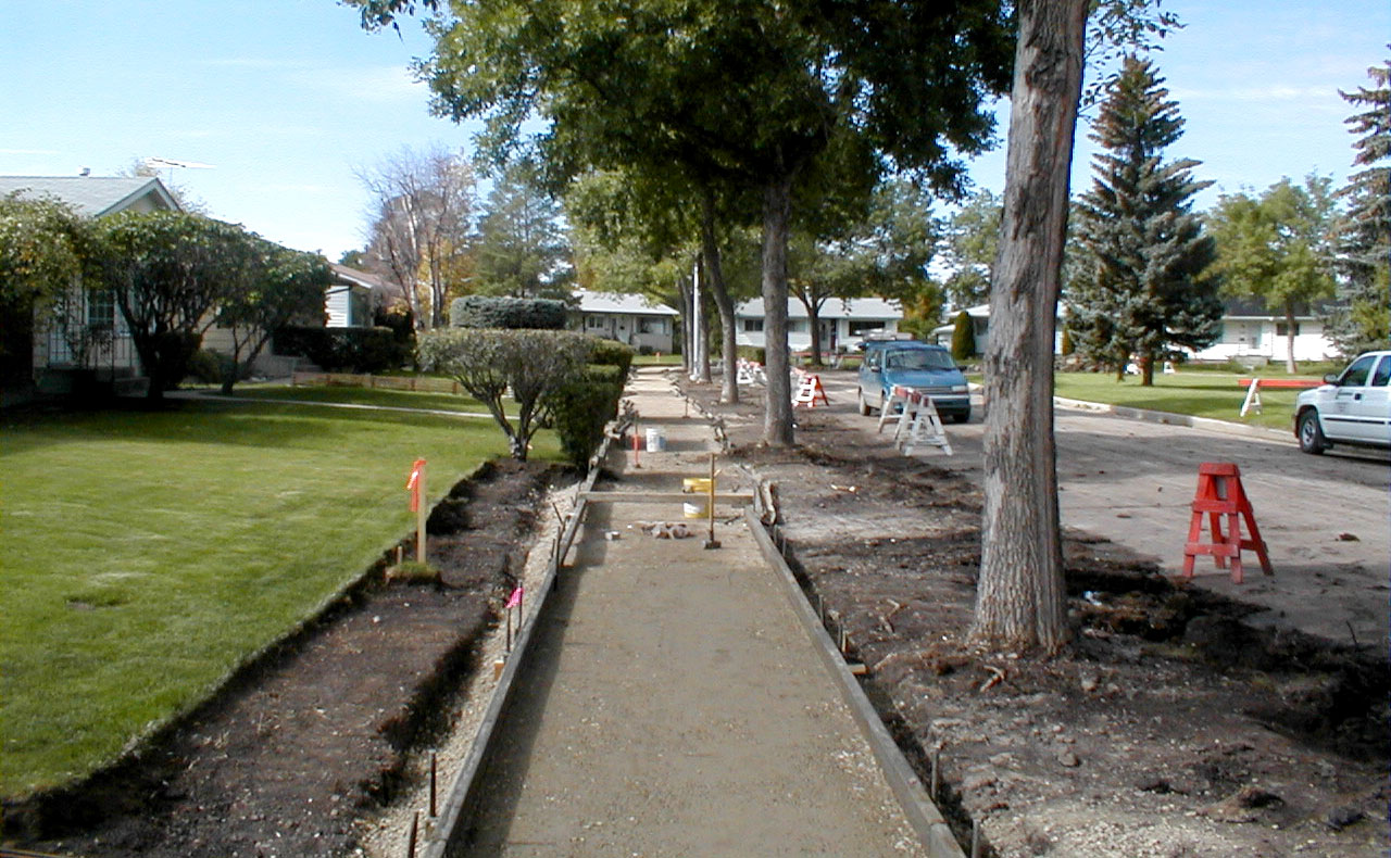 A sidewalk being paved