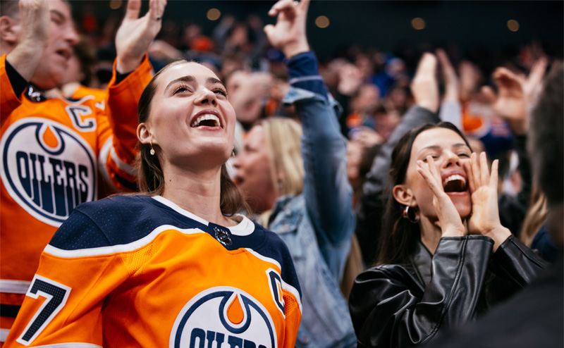 people cheering in the stands