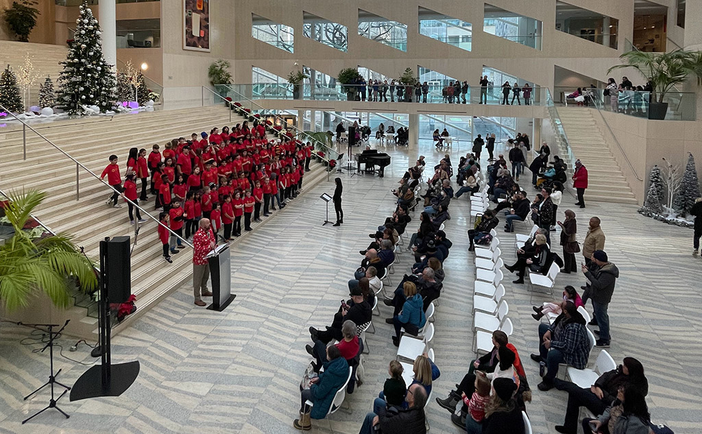 school choir on steps with audience