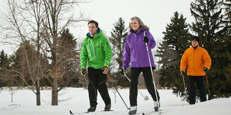 group of friends cross-country skiing