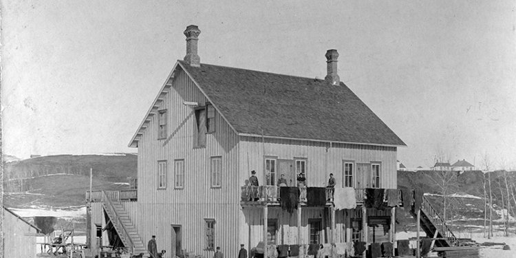 tannery with persons standing outside