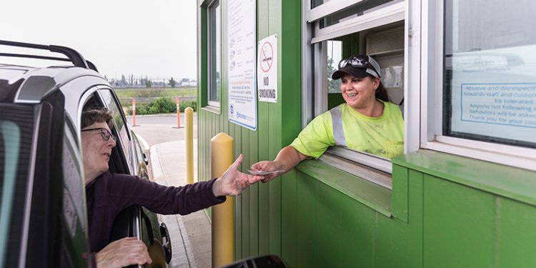 eco station attendant and customer