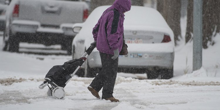 person walking in cold weather