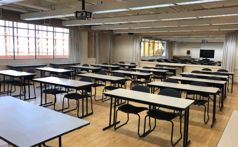 meeting room with desk/chairs