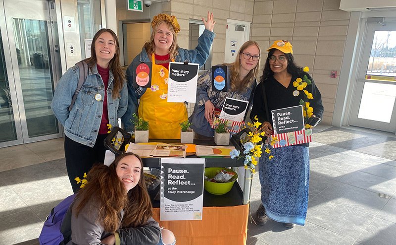 group of diverse people at train station