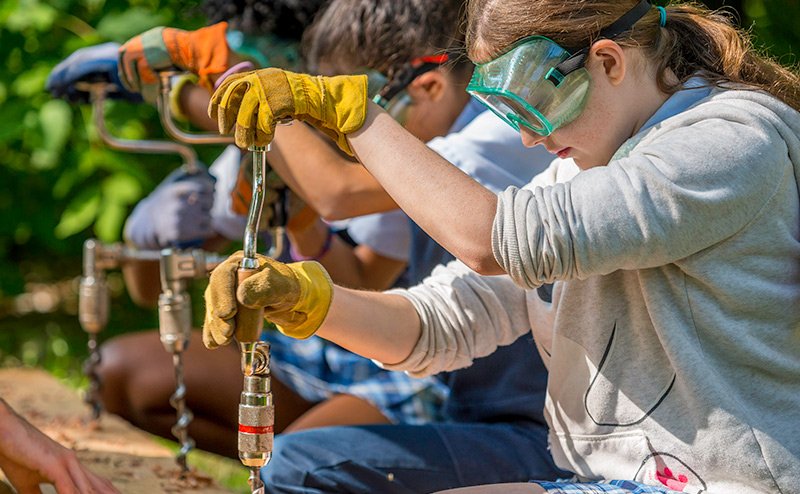 teens using wood tools