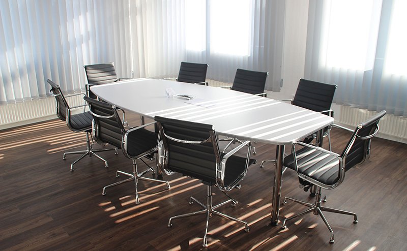 Office boardroom with table and chairs