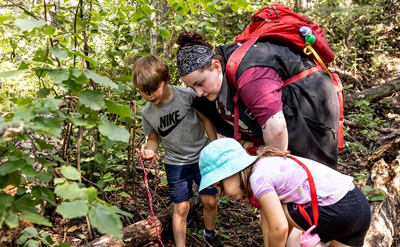 kids with interpreter in forest