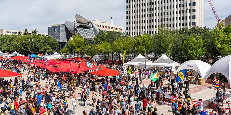 A large crowd gathers in Churchill Square to eat food and listen to music at the Cariwest Festival.