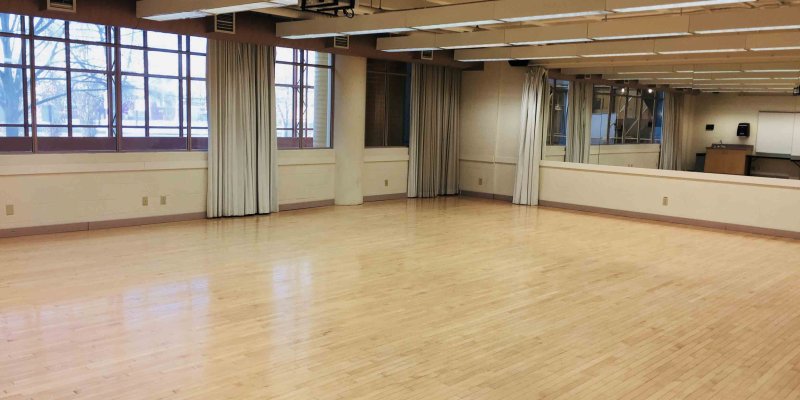 dance studio with mirrors and windows