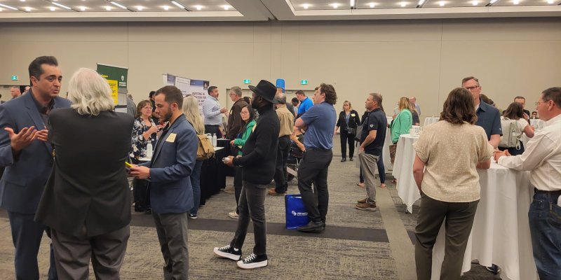 Large crowd of suppliers visiting purchasers' booths at the 2024 Purchase with Purpose event