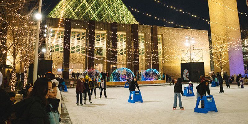 Skating outside City Hall in winter