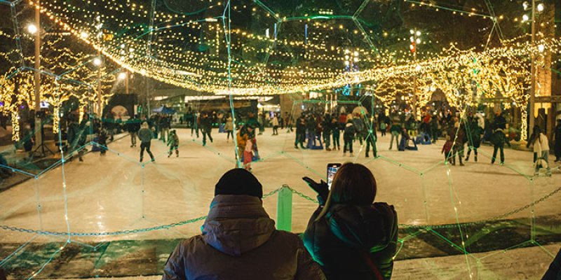 Skating outside City Hall in winter