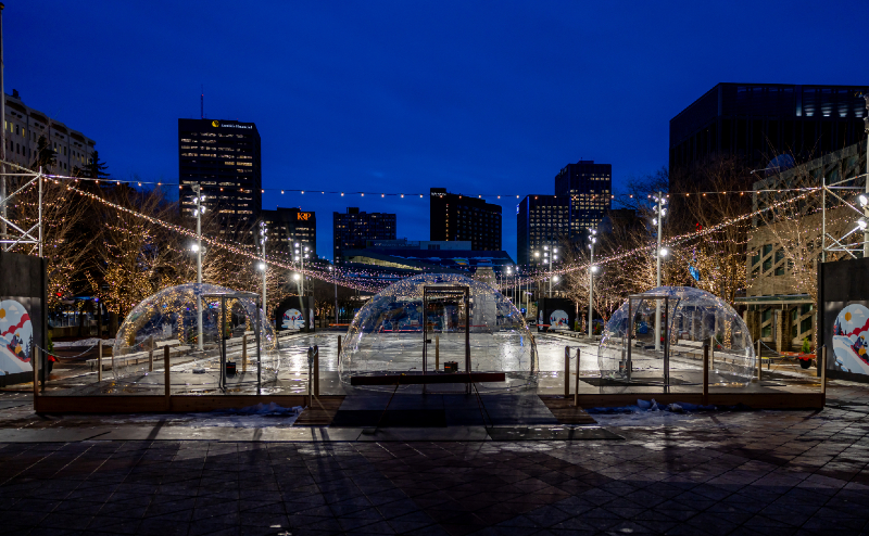 Winter warming dome with picnic table inside